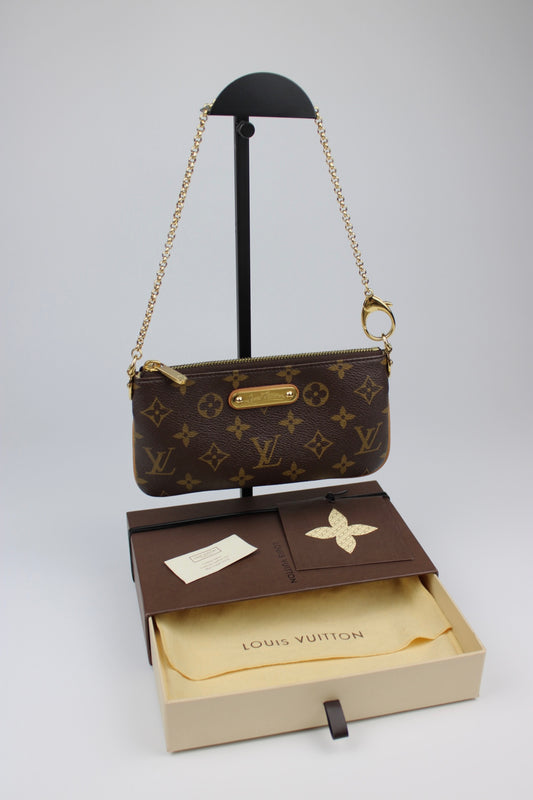 Louis Vuitton Milla Pochette Bag 2010