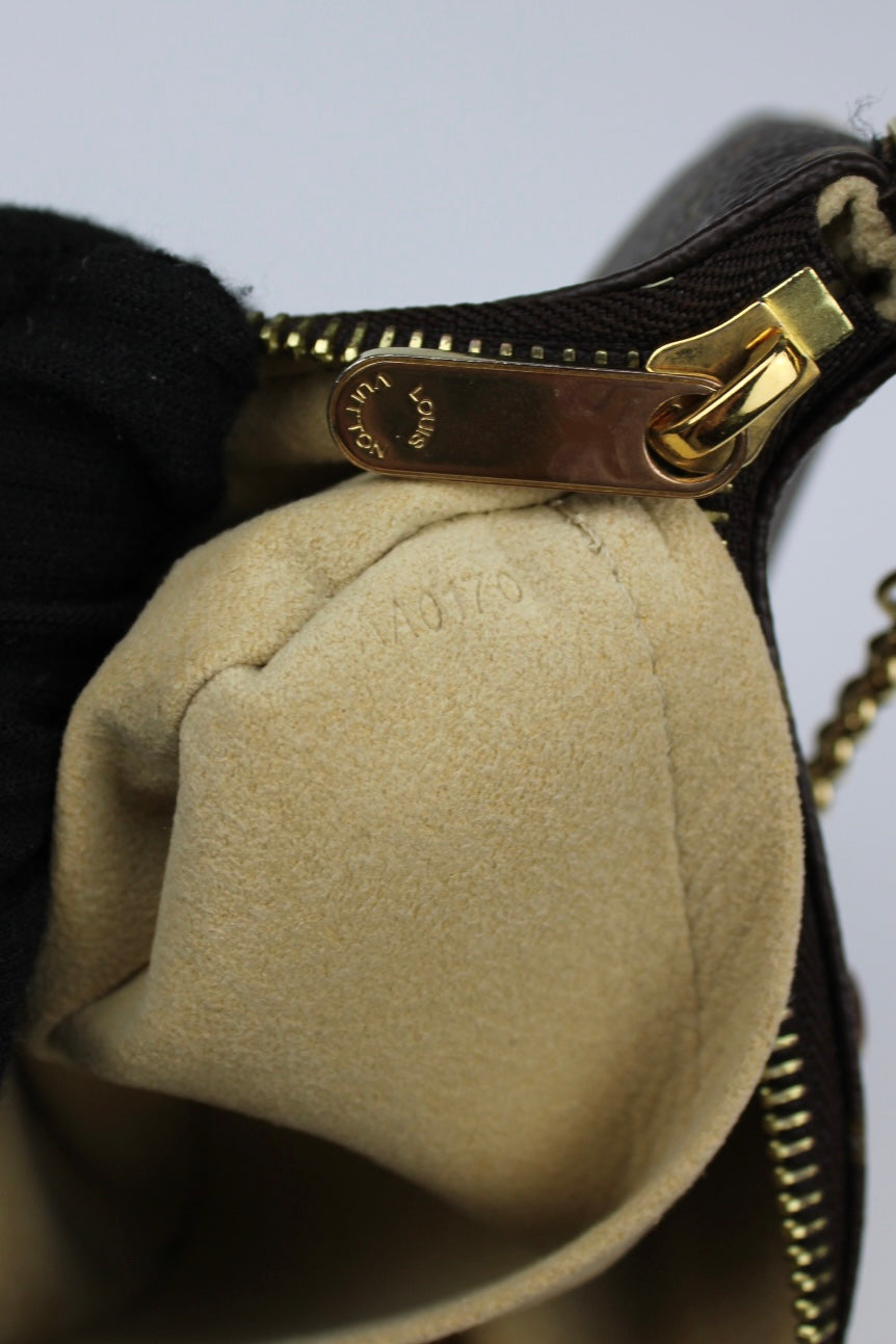 Louis Vuitton Milla Pochette Bag 2010