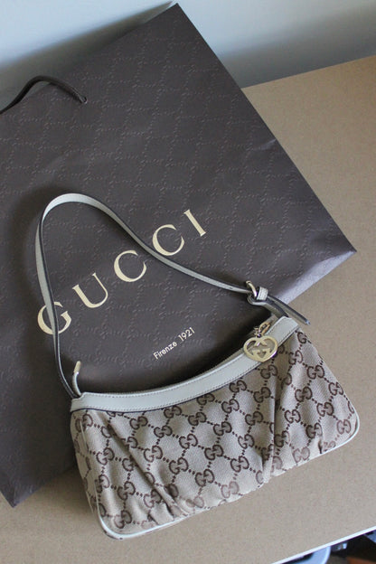 Gucci Monogram Interlocking GG Heart Charm Pochette Bag