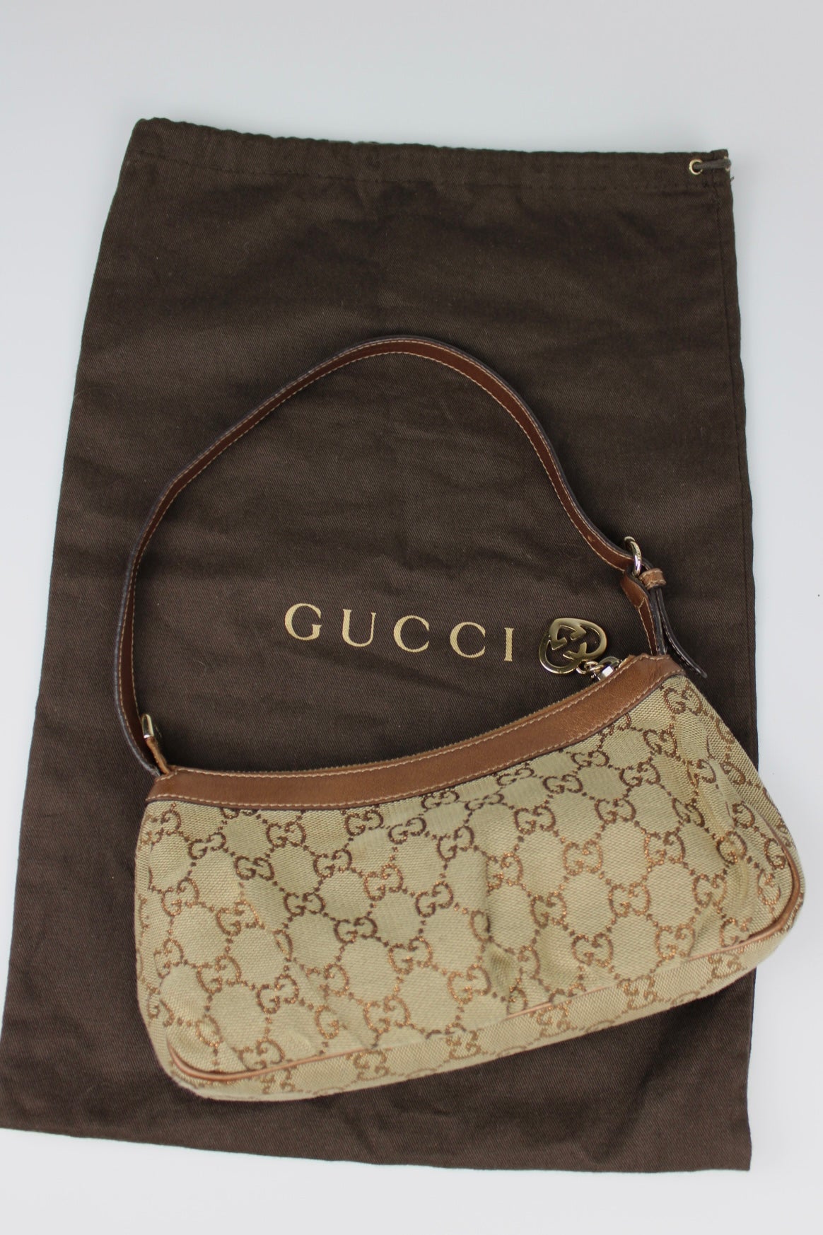 Gucci Monogram Pleated Charmy Pochette