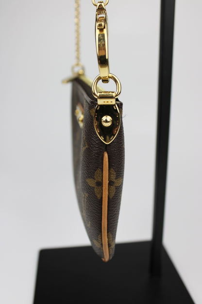 Louis Vuitton Milla Pochette Bag 2010