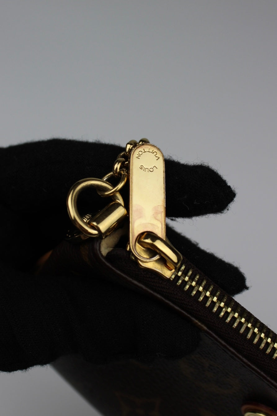 Louis Vuitton Milla Pochette Bag 2010