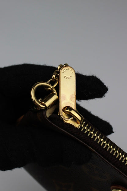 Louis Vuitton Milla Pochette Bag 2010