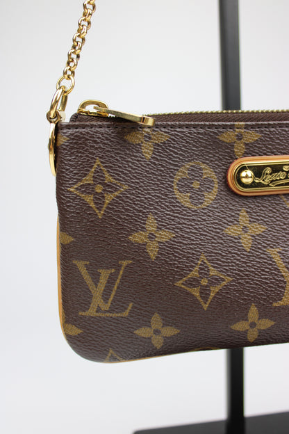 Louis Vuitton Milla Pochette Bag 2010